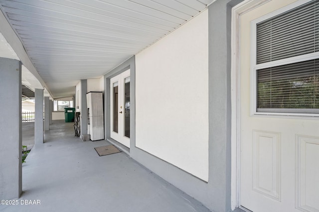 1650 Riverside Dr, Holly Hill, FL 32117 - view of patio featuring french doors