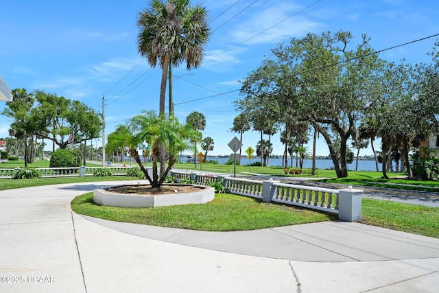 1650 Riverside Dr, Holly Hill, FL 32117 - view of home's community featuring a yard