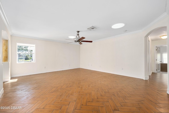 1650 Riverside Dr, Holly Hill, FL 32117 - spare room featuring arched walkways, ceiling fan, and ornamental molding