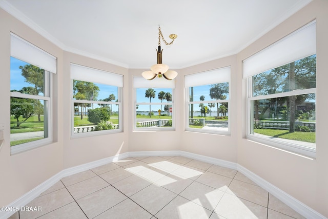 1650 Riverside Dr, Holly Hill, FL 32117 - unfurnished sunroom featuring tile patterned floors, ornamental molding, and a chandelier