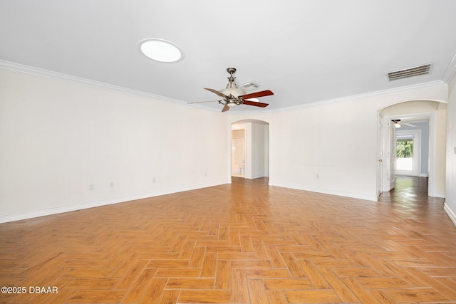 1650 Riverside Dr, Holly Hill, FL 32117 - spare room featuring arched walkways, a ceiling fan, and ornamental molding