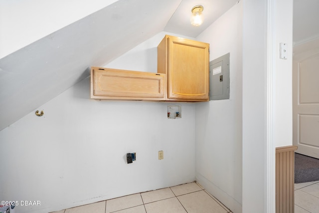 1650 Riverside Dr, Holly Hill, FL 32117 - laundry room with cabinet space, electric panel, light tile patterned floors, and hookup for a washing machine