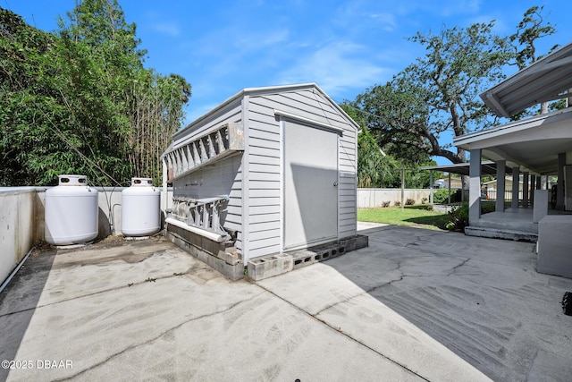 1650 Riverside Dr, Holly Hill, FL 32117 - garage featuring a storage shed