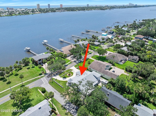 1650 Riverside Dr, Holly Hill, FL 32117 - aerial view of property and surrounding area featuring a large body of water and nearby urban area