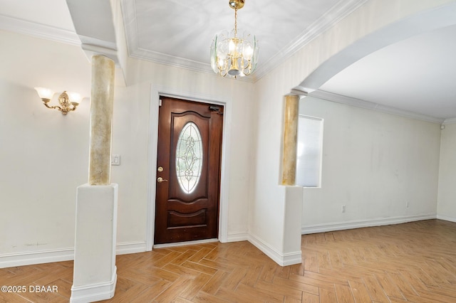 1650 Riverside Dr, Holly Hill, FL 32117 - foyer featuring a chandelier, decorative columns, arched walkways, and crown molding