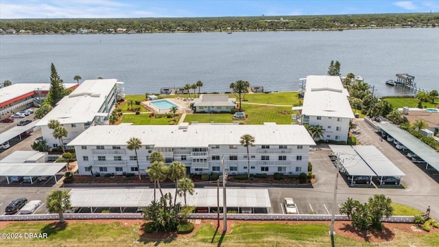 birds eye view of property featuring a water view