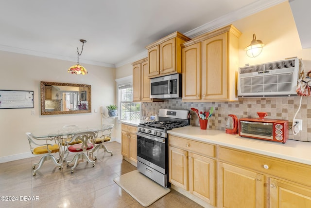 kitchen with an AC wall unit, ornamental molding, appliances with stainless steel finishes, light brown cabinetry, and hanging light fixtures