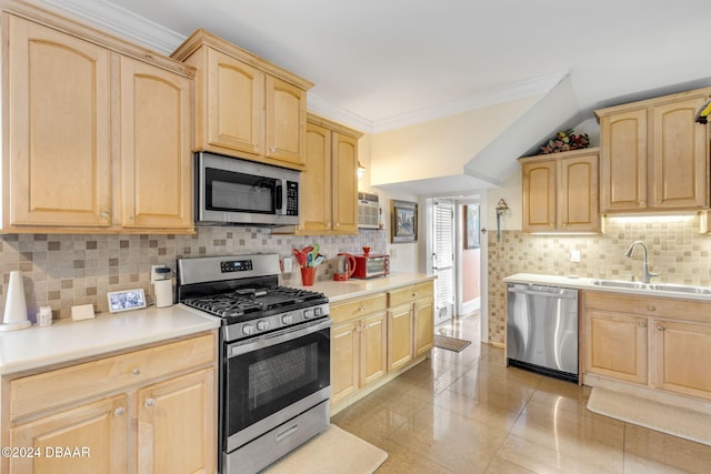 kitchen featuring stainless steel appliances, decorative backsplash, sink, crown molding, and light brown cabinets