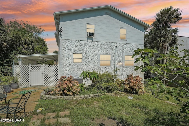 view of property exterior at dusk