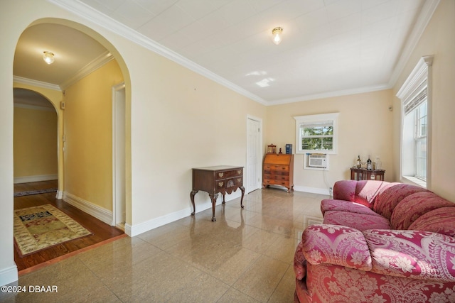 living room featuring wood-type flooring, an AC wall unit, and ornamental molding