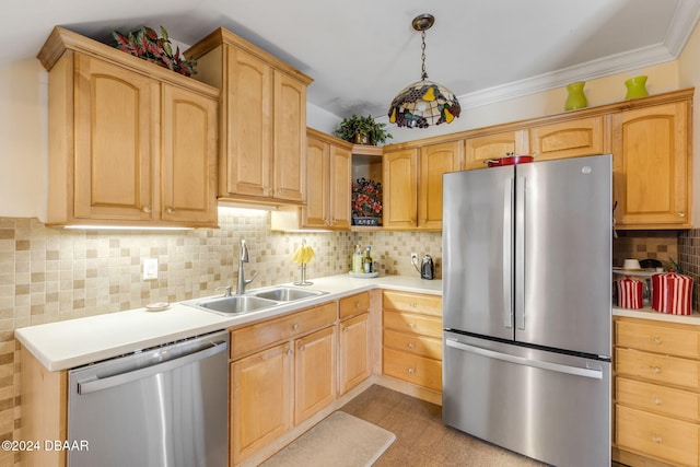 kitchen with backsplash, sink, pendant lighting, and appliances with stainless steel finishes