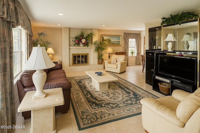2944 Ocean Shore Blvd, Ormond Beach, FL 32176 - living room featuring light tile patterned flooring, crown molding, a fireplace, and recessed lighting
