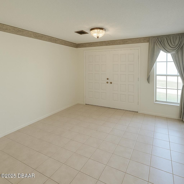 2944 Ocean Shore Blvd, Ormond Beach, FL 32176 - entrance foyer featuring light tile patterned flooring