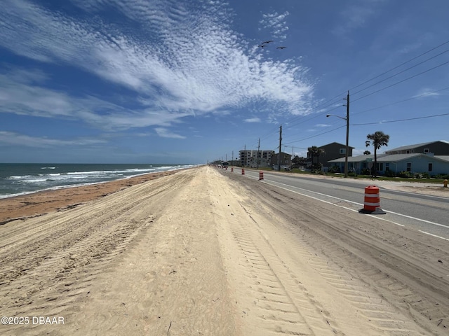 2944 Ocean Shore Blvd, Ormond Beach, FL 32176 - view of asphalt road featuring street lighting and a water view