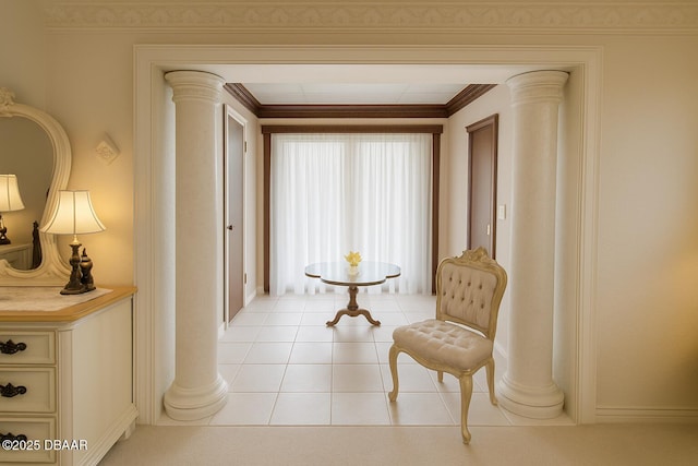2944 Ocean Shore Blvd, Ormond Beach, FL 32176 - living area featuring decorative columns, light tile patterned flooring, ornamental molding, and baseboards