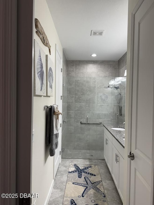 168 Ocean Hammock Loop, Daytona Beach, FL 32124 - bathroom featuring a shower stall, vanity, and marble finish floors