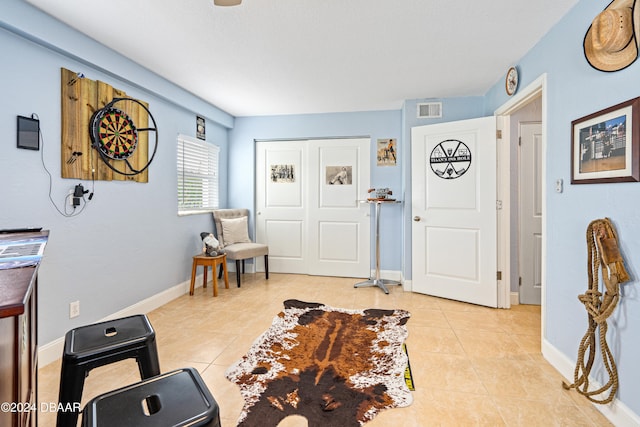 foyer with light tile patterned flooring