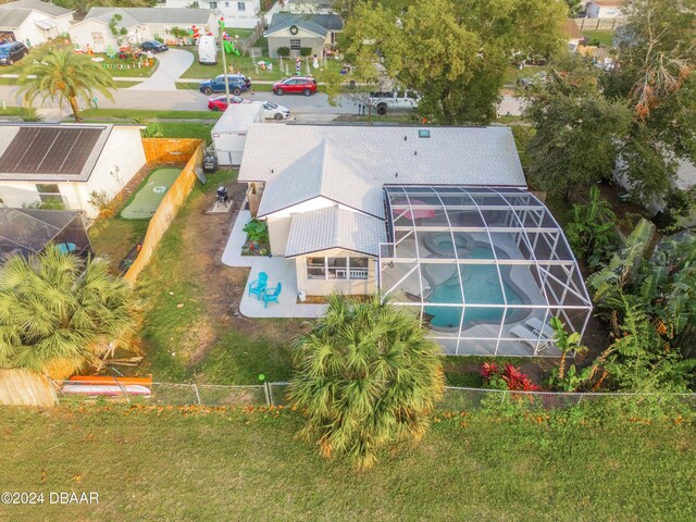 view of front of property with a front yard and a garage