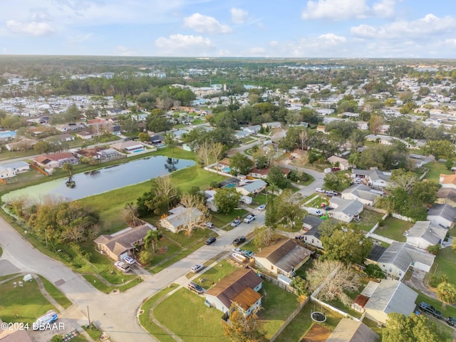 bird's eye view with a water view and a residential view