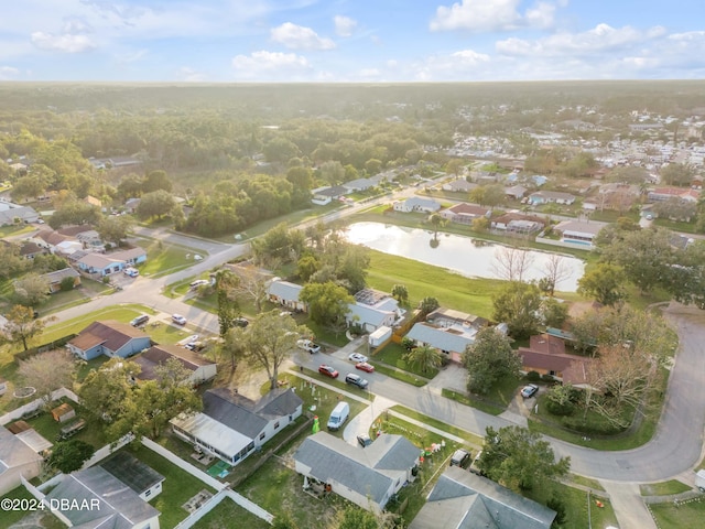 bird's eye view with a water view and a residential view