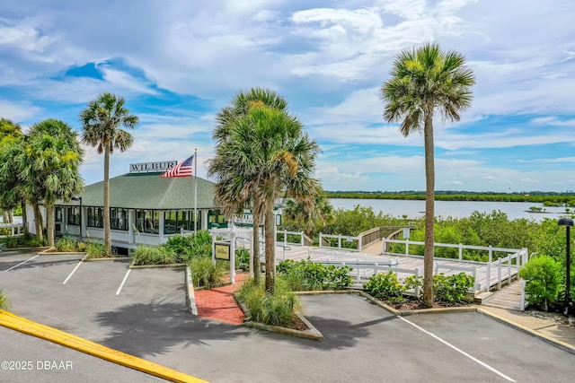 4026 Cardinal Blvd, Wilbur-By-The-Sea, FL 32127 - view of property with uncovered parking and a water view