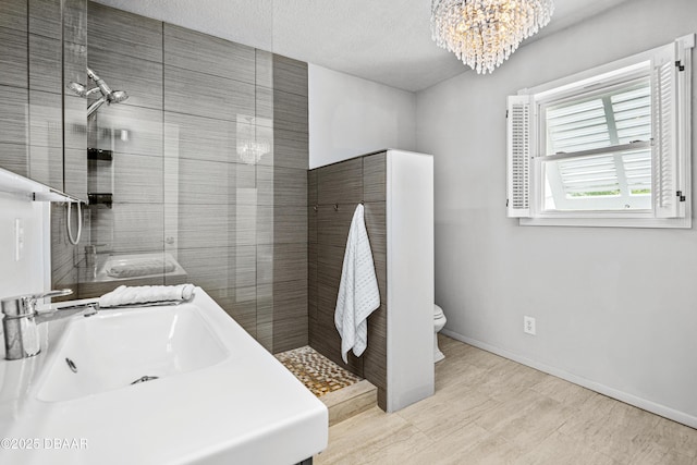 4026 Cardinal Blvd, Wilbur-By-The-Sea, FL 32127 - full bath with a chandelier, a tile shower, and vanity