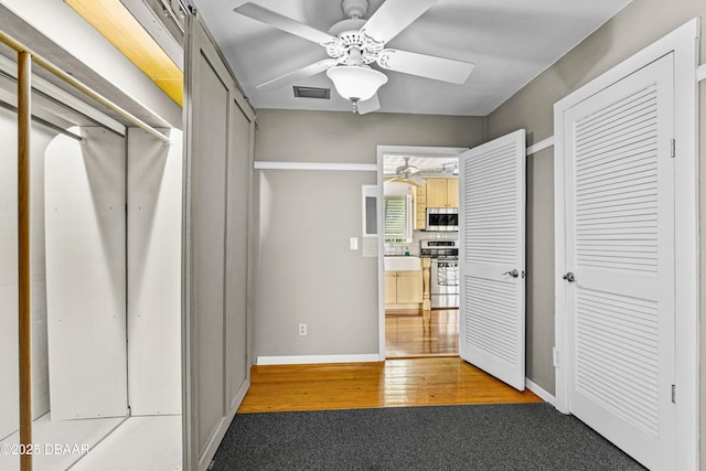 4026 Cardinal Blvd, Wilbur-By-The-Sea, FL 32127 - corridor featuring light wood-style floors and baseboards