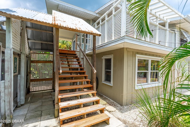 4026 Cardinal Blvd, Wilbur-By-The-Sea, FL 32127 - view of exterior entry featuring a metal roof
