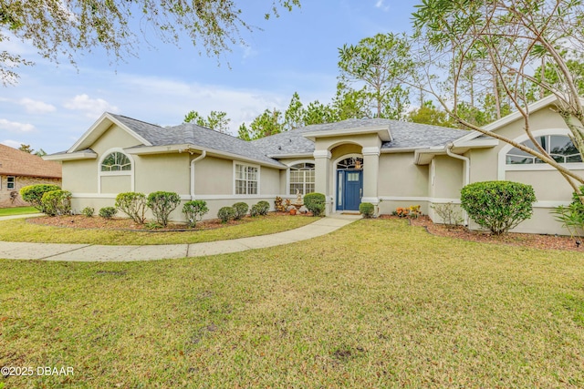 ranch-style home with a front yard