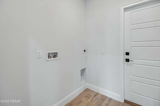 washroom with hookup for a washing machine and hookup for an electric dryer