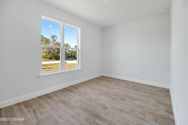 empty room featuring light wood-type flooring