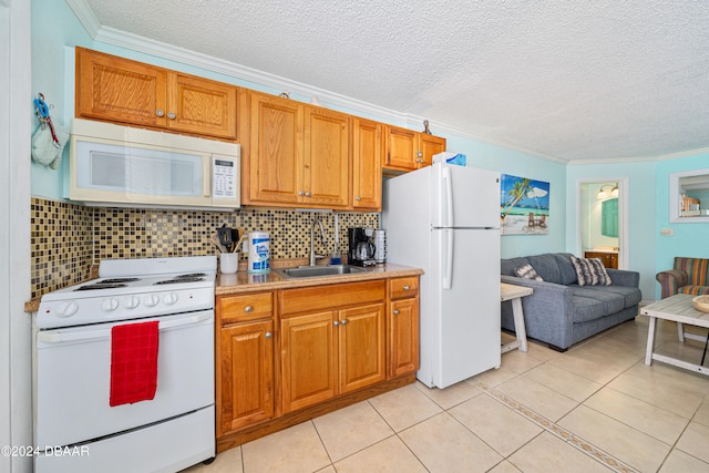 kitchen with sink, ornamental molding, light tile patterned floors, white appliances, and decorative backsplash