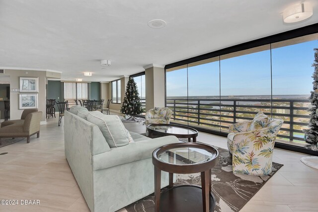 tiled living room with expansive windows