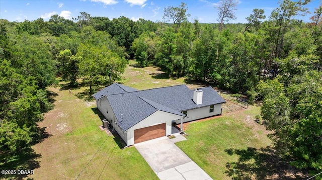 2455 Whooping Crane Dr, Deleon Springs, FL 32130 - view from above of property with a forest