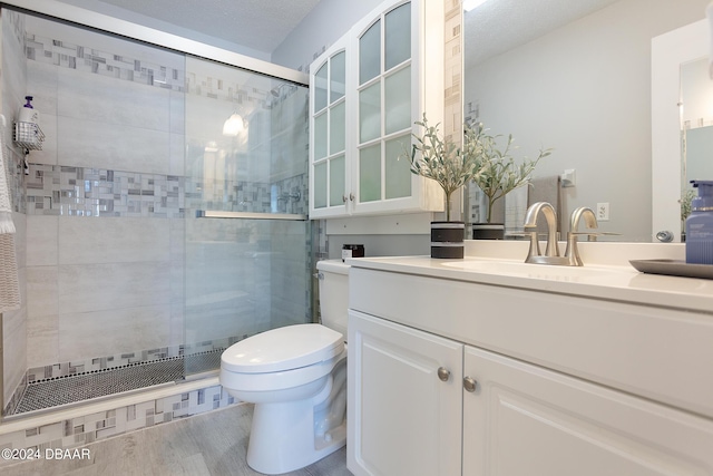 3750 S Atlantic Ave Unit 180, Daytona Beach Shores, FL 32118 - bathroom featuring toilet, a shower stall, and vanity