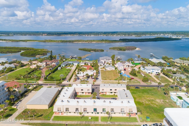 bird's eye view with a water view