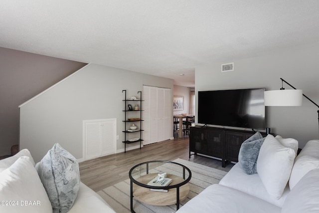 3750 S Atlantic Ave Unit 180, Daytona Beach Shores, FL 32118 - living room featuring wood finished floors and baseboards