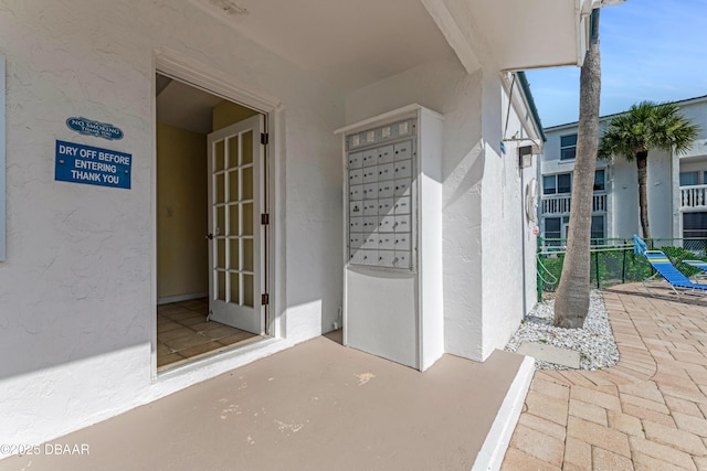 4590 S Atlantic Ave Unit 244A, Ponce Inlet, FL 32127 - property entrance with stucco siding