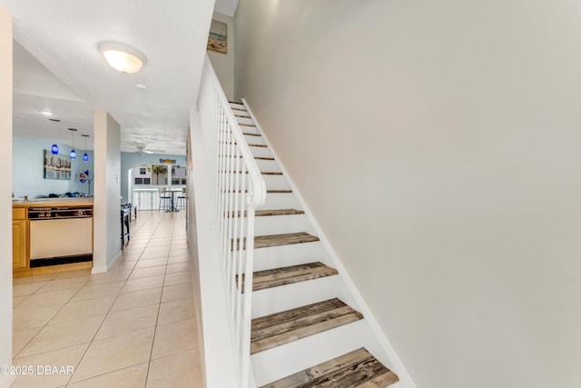 4590 S Atlantic Ave Unit 244A, Ponce Inlet, FL 32127 - stairway with tile patterned flooring and a ceiling fan