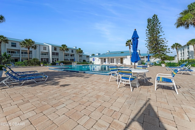 4590 S Atlantic Ave Unit 244A, Ponce Inlet, FL 32127 - community pool featuring a patio area