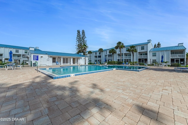 4590 S Atlantic Ave Unit 244A, Ponce Inlet, FL 32127 - community pool featuring a patio