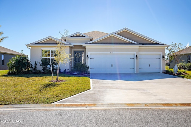 ranch-style home with a front yard and a garage