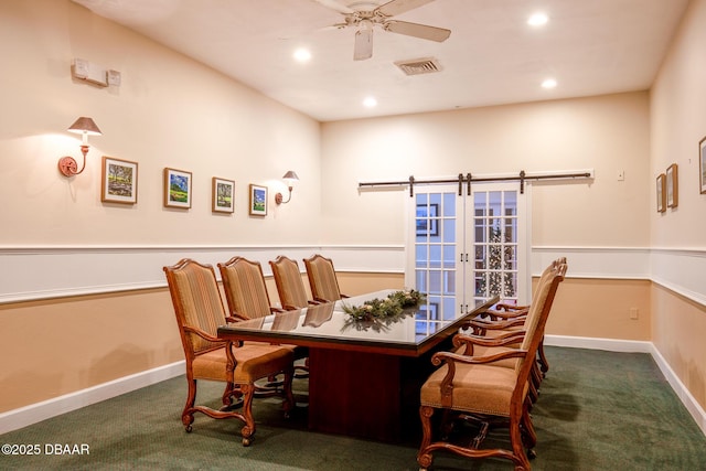 carpeted dining room featuring french doors and ceiling fan