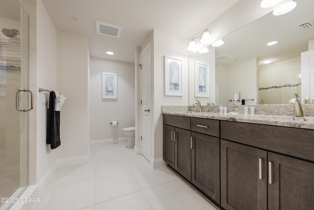 3721 S Atlantic Ave Unit 1101, Daytona Beach Shores, FL 32118 - full bath with a shower stall, double vanity, tile patterned floors, and recessed lighting