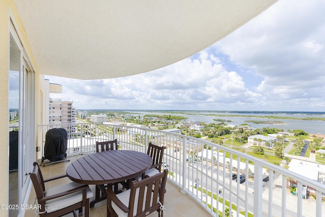 3721 S Atlantic Ave Unit 1101, Daytona Beach Shores, FL 32118 - balcony with a water view and a grill