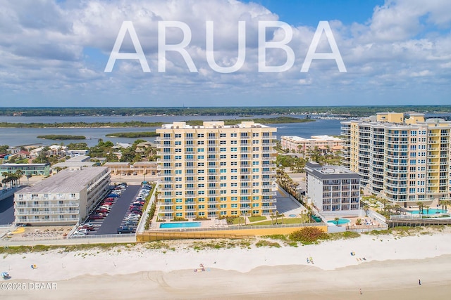 3721 S Atlantic Ave Unit 1101, Daytona Beach Shores, FL 32118 - drone / aerial view of a large body of water and apartment complex