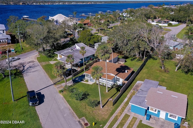 drone / aerial view with a water view