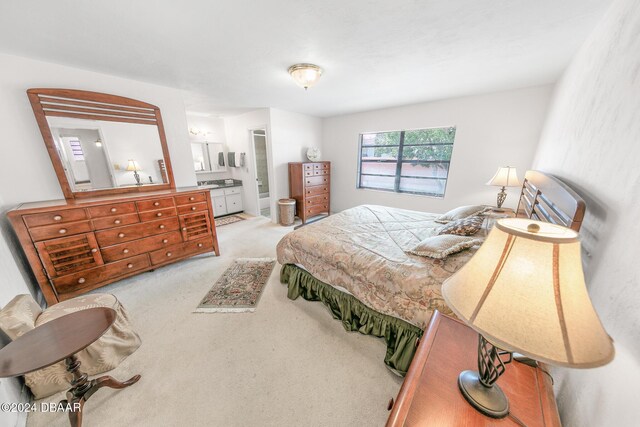 110 Ponce Terrace Cir, Ponce Inlet, FL 32127 - bedroom with carpet floors and ensuite bathroom