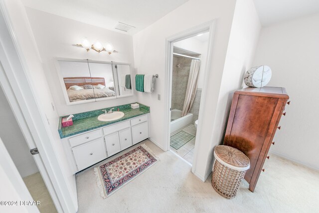 110 Ponce Terrace Cir, Ponce Inlet, FL 32127 - ensuite bathroom with vanity and shower / tub combination