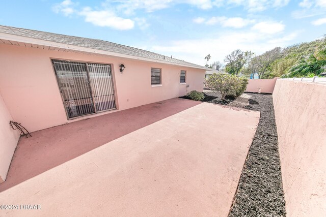 110 Ponce Terrace Cir, Ponce Inlet, FL 32127 - view of patio with a fenced backyard